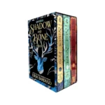 Shadow and Bone trilogy collector's box set showing the foil-stamped slipcase with three books and a map of the Grishaverse.